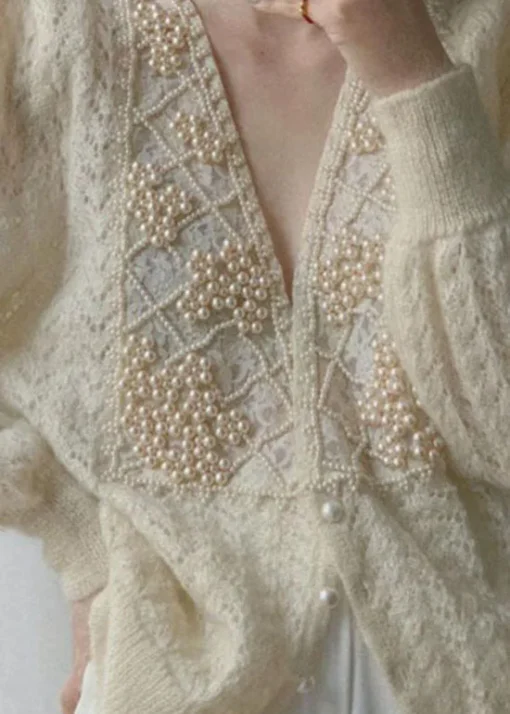 V-neck thick knit with pearl buttons - Image 2